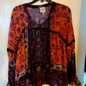 Knox rose sheer blouse with ruffles and ties at neck